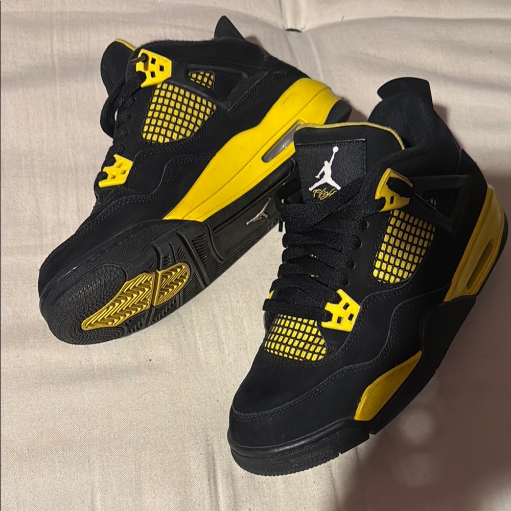 Air Jordan Retro 4 Black and Yellow Sneakers